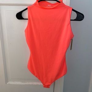 SKIMS fits everybody high neck bodysuit
